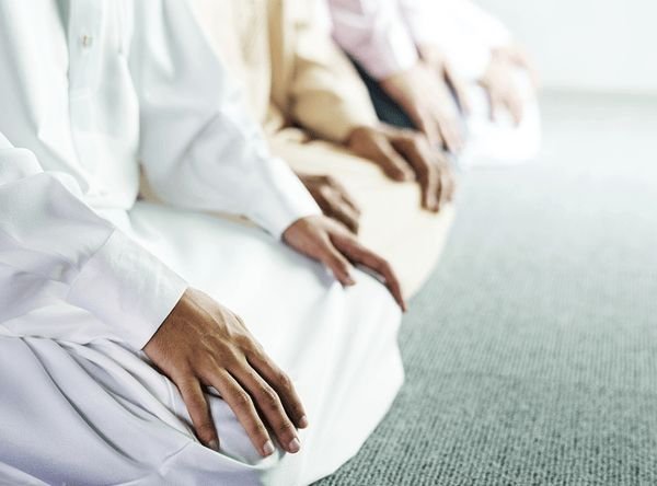Download premium image of Muslim prayers in Tashahhud posture by Chanikarn Thongsupa about muslim prayer, jummah mubarak, masjid, ramadan, and prayer rug 425823